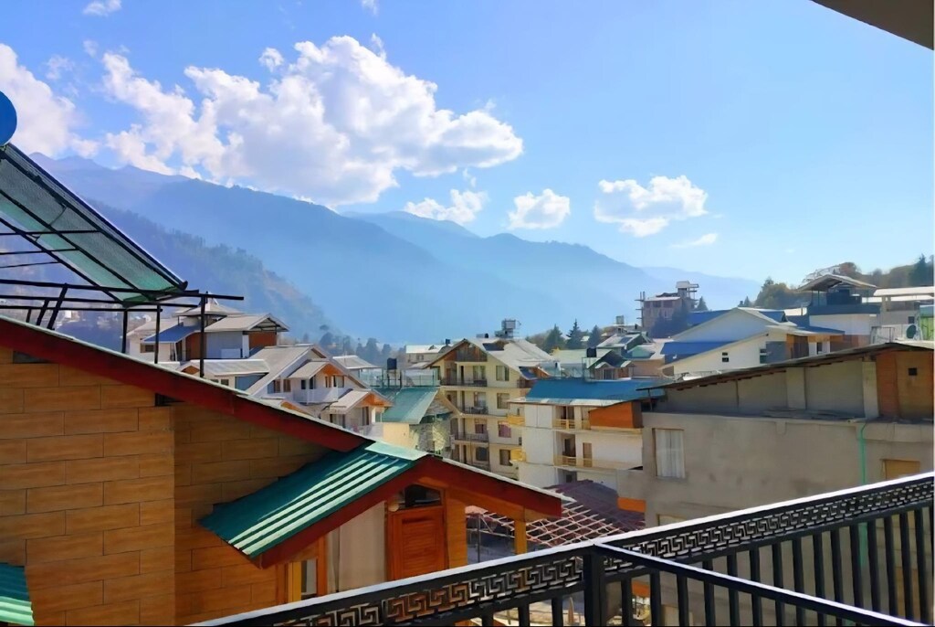 Balcony view of Manali valley and Himalayas